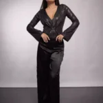 Detalle de tela plisada con hilo lurex y lentejuelas en body de fiesta